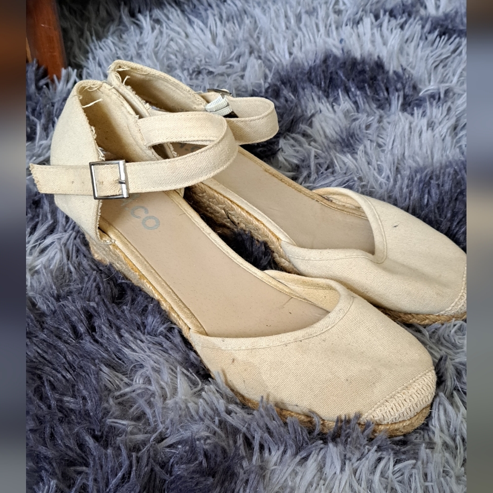 Beachy beige wedges with ankle support.